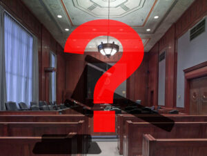 Courtroom with gavel and question mark.
